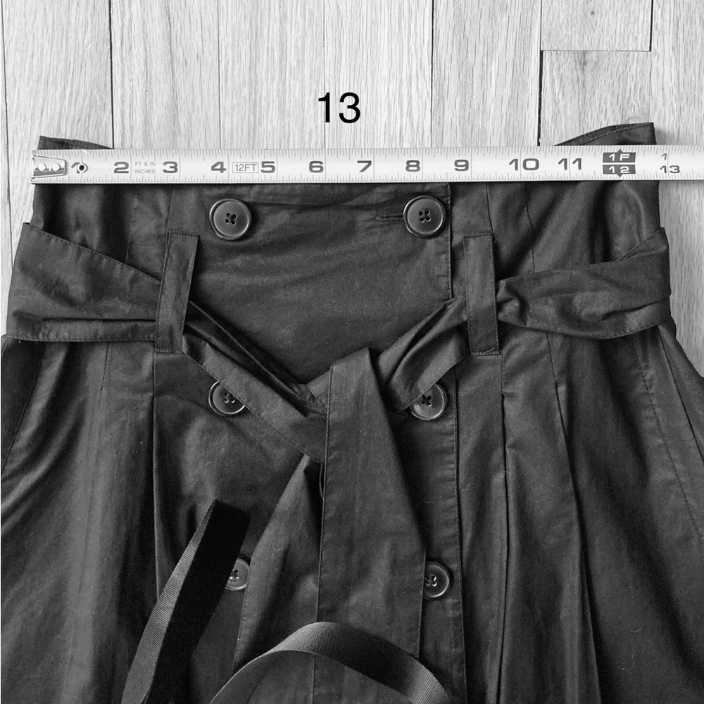 EUC H&M High Waisted dirndl skirt. Double Breasted w/self belt, Black.
Size 4 - Picture 15 of 16
